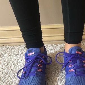 Neon purple nike running shoes